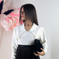 Maglia con collo gioiello