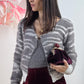 Twinset (top e cardigan con spilla)