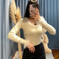 Maglia con piume